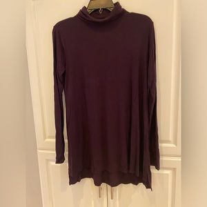 Woman’s soft tunic turtle neck